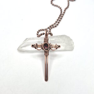 Cross with faceted Garnet pendant